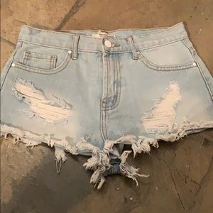 Jean Shorts with fringe and tears